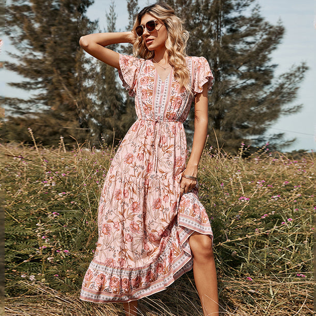 2022 Europe and the United States spring and summer new Lotus leaf short-sleeve V-neck strap pink printed mid-length women's dress wholesale