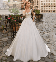 Foreign trade wedding dress wedding bride 2021 new long sleeve shoulder Korean style long tail satin lace custom